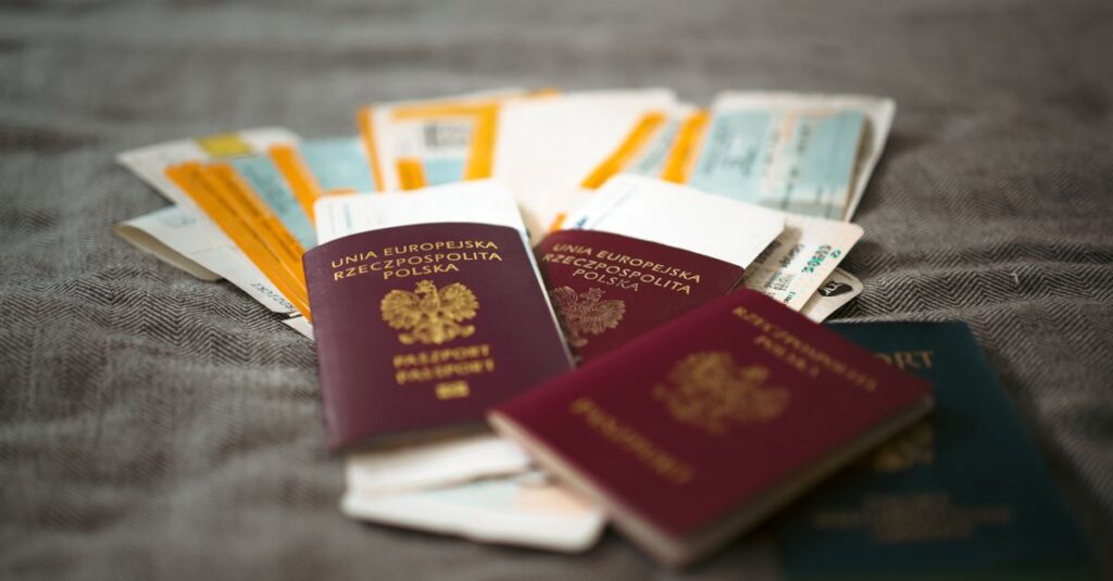 Close-up of Polish passports and travel tickets symbolizing travel and adventure.